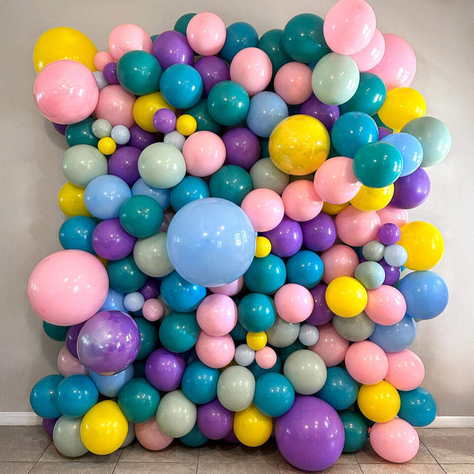 Pastel Pop Balloon Wall balloon wall with a bold and pastel color palette