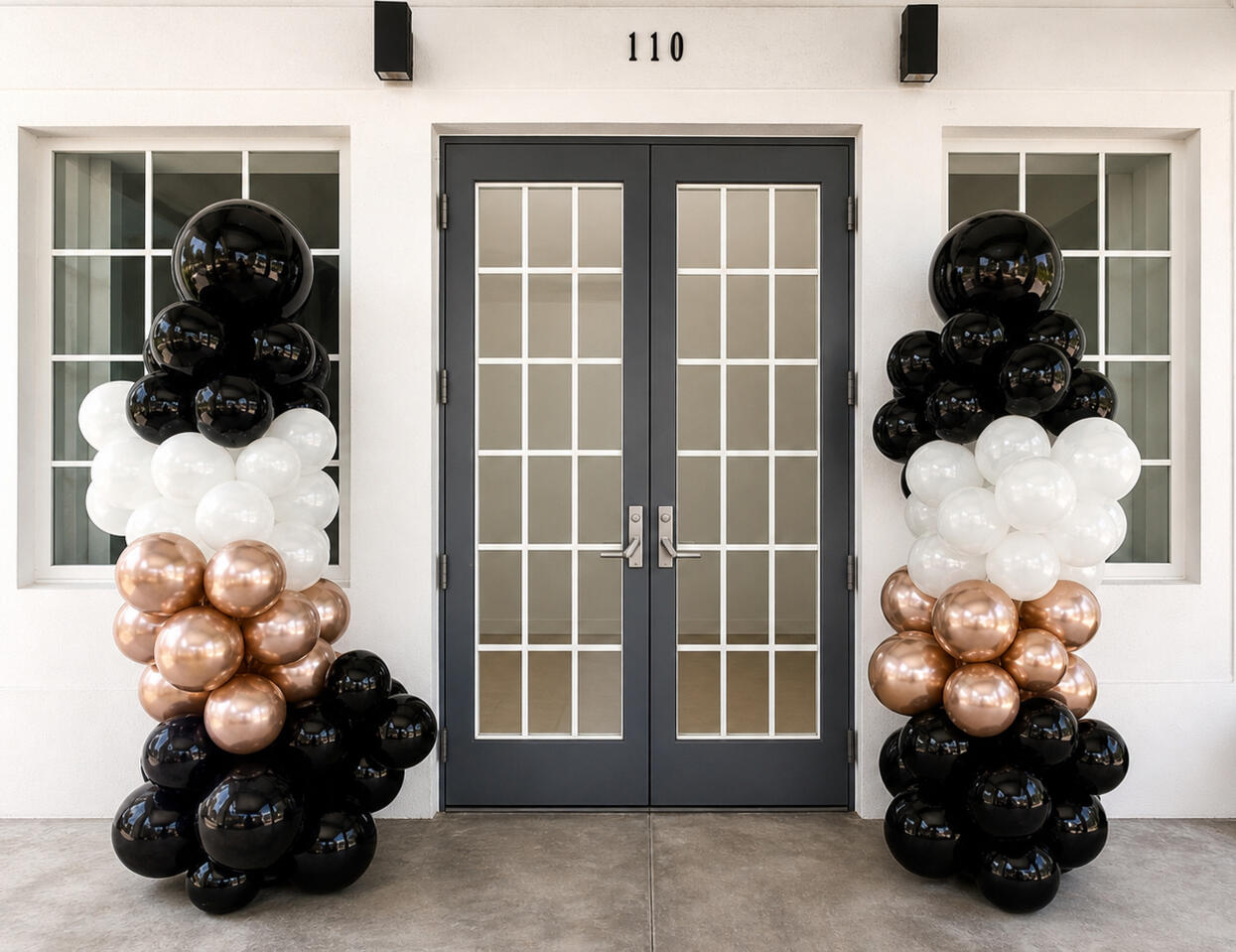 UnGrand Entrance Columns Elegant balloon columns designed to welcome guests and create a memorable first impression while complementing the event's color palette and theme.