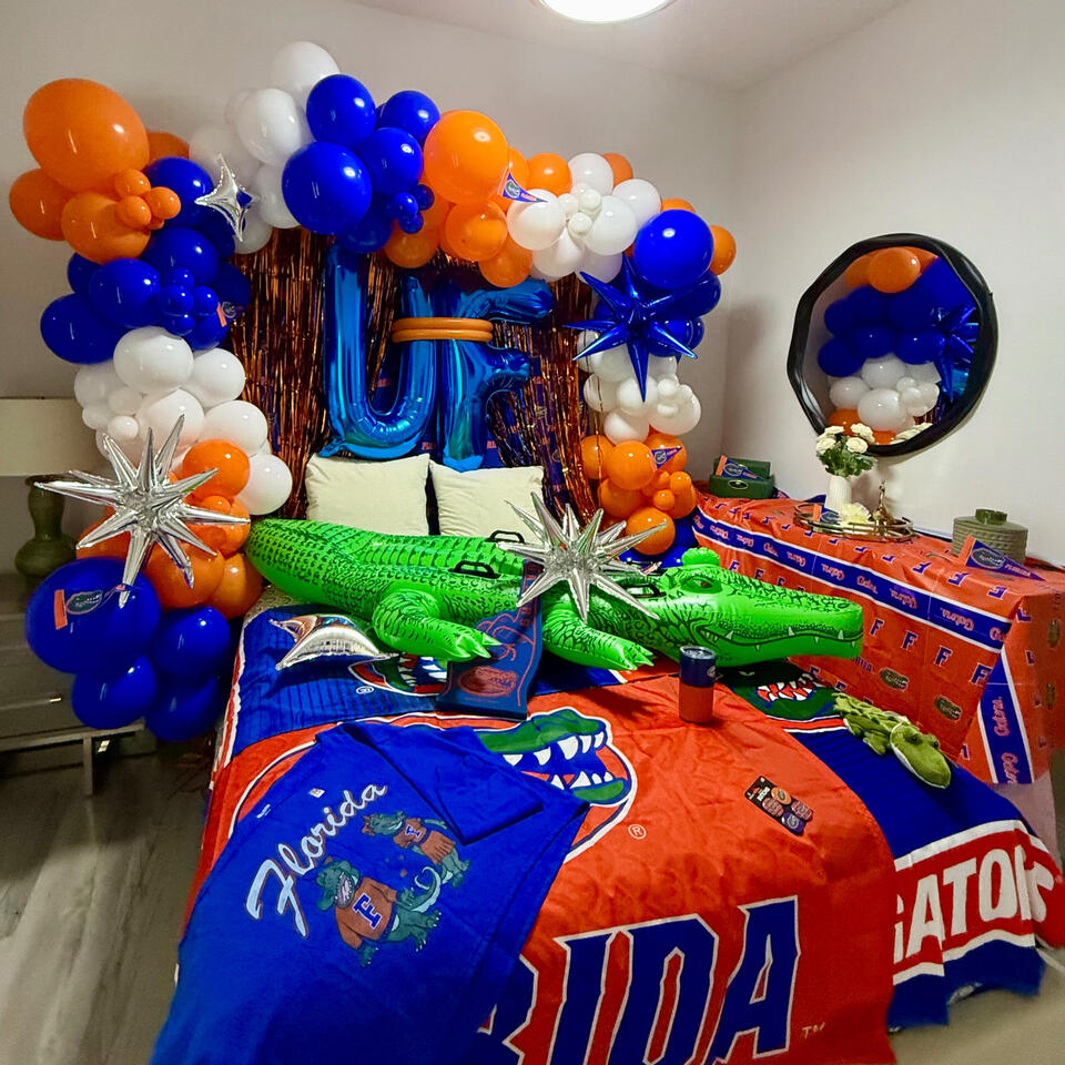 university of florida bed party set up with organic balloon garland