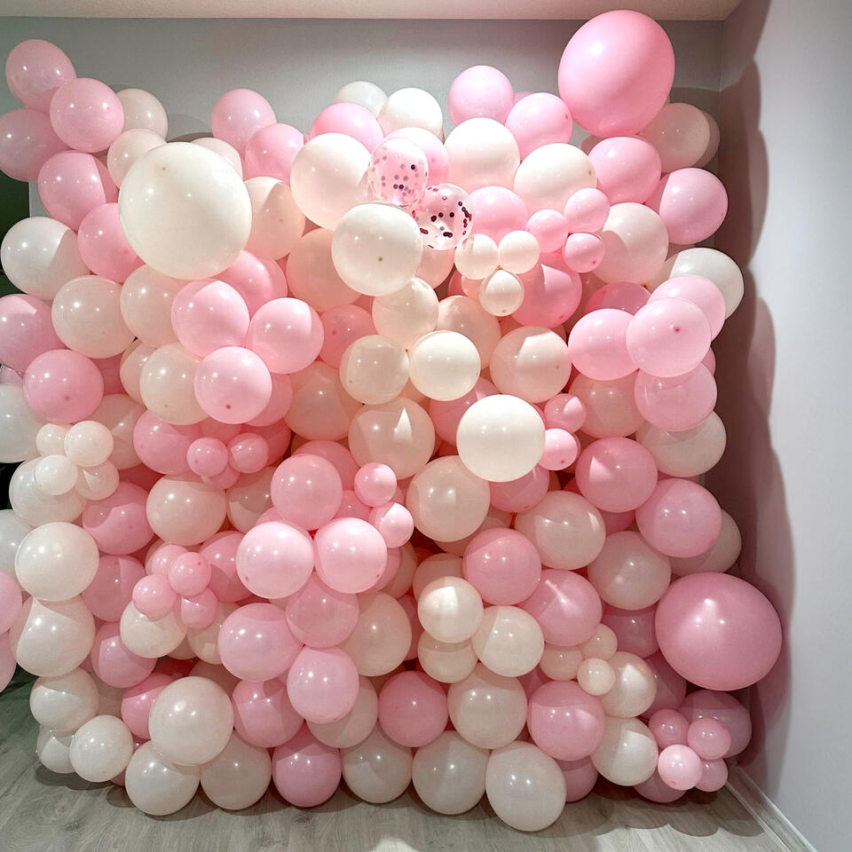 ten by ten organic balloon wall in monochrome shades of pink